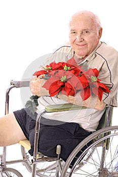 Handicap man in wheelchair with flowers