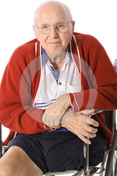 Handicap man in wheelchair with leg amputation photo