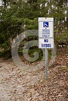 Handicap and service vehicle parking only - no buses