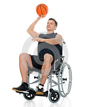 Handicapped basketball player throwing ball