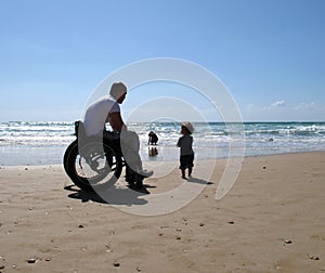 Handicapped Dad with Child