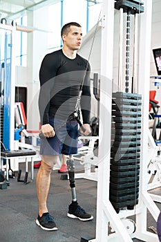 Handicapped Muscular Man Working Out Using Machines