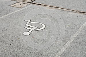 Handicapped Parking on black asphalt