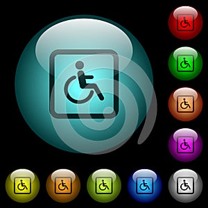 Handicapped parking icons in color illuminated glass buttons