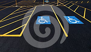 Handicapped parking stalls in a new parking lot.