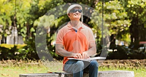 Handicapped People With Disability Blind Man Reading Braille Boo photo