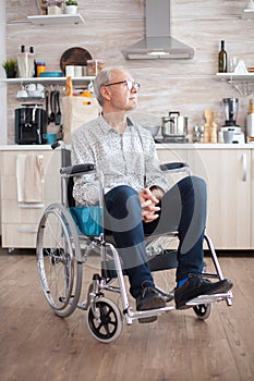 Handicapped senior man sitting in wheelchair