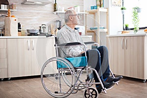 Handicapped senior man in wheelchair