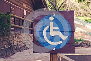 Handicapped sign at forest photograph