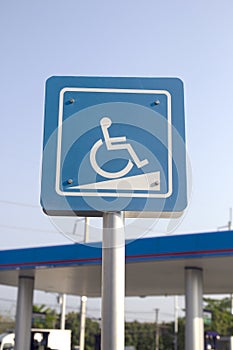 Handicapped sign in a gas station in Thailand