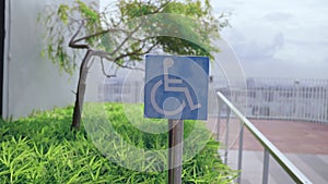 Handicapped Sign On The Roof