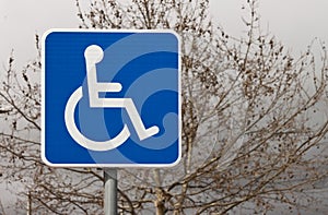 Handiccaped reserved parking lot sign