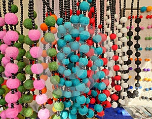 Handicraft colorful pearl necklaces in market stall