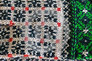 Handicraft concept, close-up of knit writing, knitting as a hobby
