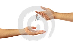 Handing over the house key. Hands isolated on white background, clipping path photo