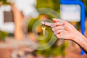 Handing over key for new house