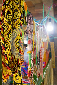 The handiwork of the Dayak tribe made of yellow beads