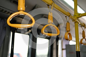 handle on commuter bus. public transport