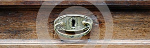 Handle of the drawer of an antique furniture.