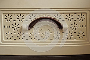 handle on a gray plastic kitchen cabinet