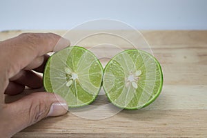 Handle Half a lemon on wooden