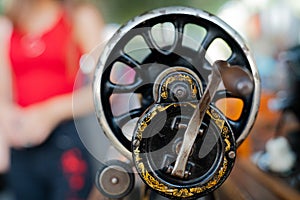 Handle, hand drive and flywheel of an antique sewing machine