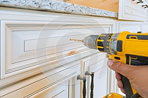 Handle installation drawers in kitchen cabinet