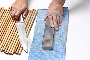 Handle the knife to make a sharp knife with a whetstone.
