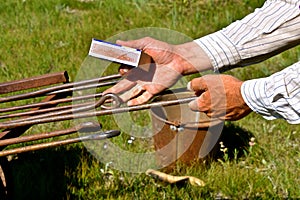 Handles of branding irons heating up