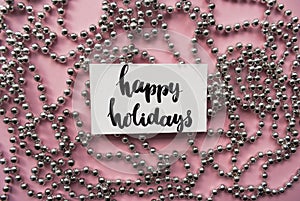 Handlettering words happy holidays and christmas garland