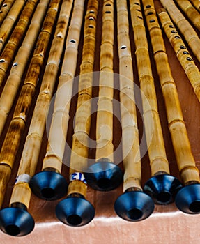 Handmade bamboo shrill pipes in display