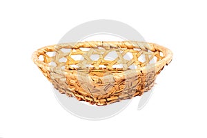 Handmade basket in the shape of a heart is located with a point in the camera and isolated on a white background