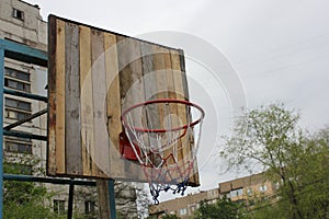 Handmade basketball board with metal hoop and basket