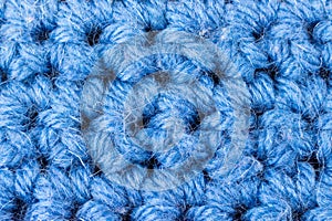 Handmade blue knitting wool texture background