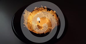 Handmade candle made of natural wax. Home decor