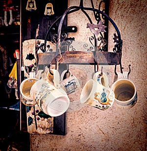 Handmade ceramic mugs at street market in Besalu, Spain