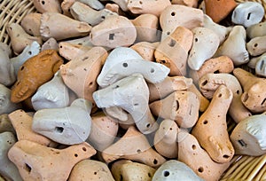 Handmade ceramic whistles in the form of birds