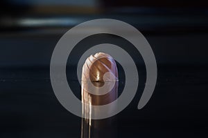 Handmade chocolate on black background .