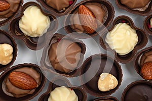 Handmade chocolates close-up. Confectionery products, top view