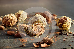 Handmade chocolates sprinkled with pistachio crumbs