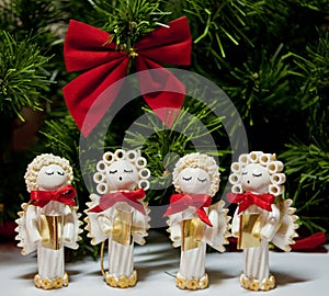 Handmade Christmas angels carolers made from pasta