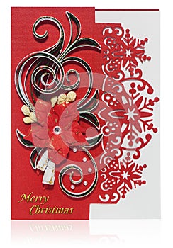 Handmade Christmas card with Merry Christmas greetings and poinsettia, bells.