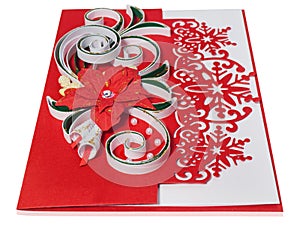 Handmade Christmas card with Merry Christmas greetings and poinsettia, bells.