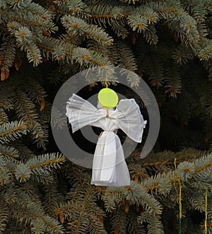 Handmade christmas decoration angel from paper