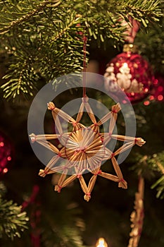 Handmade christmas ornament on a pine christmas tree