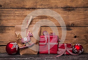 Handmade christmas presents wrapped in paper with red white chec