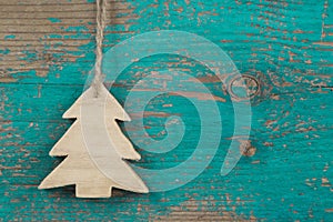 Handmade christmas tree for a wooden christmas background