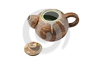 Handmade clay teapot Isolated on a white background. Antique pottery