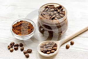 Handmade coffee-cocoa scrub on wooden background close up