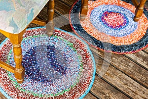 Handmade colorful rugs on a wooden floor